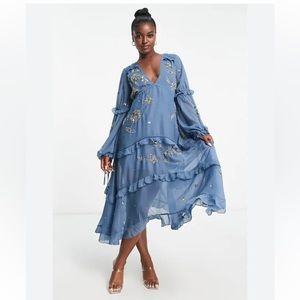 blue dress with gold sequins. It’s in great condition.